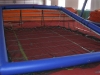 Self-filling pool with underwater security netting