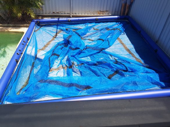 Shark and stinger-safe inflatable netted sea pool
